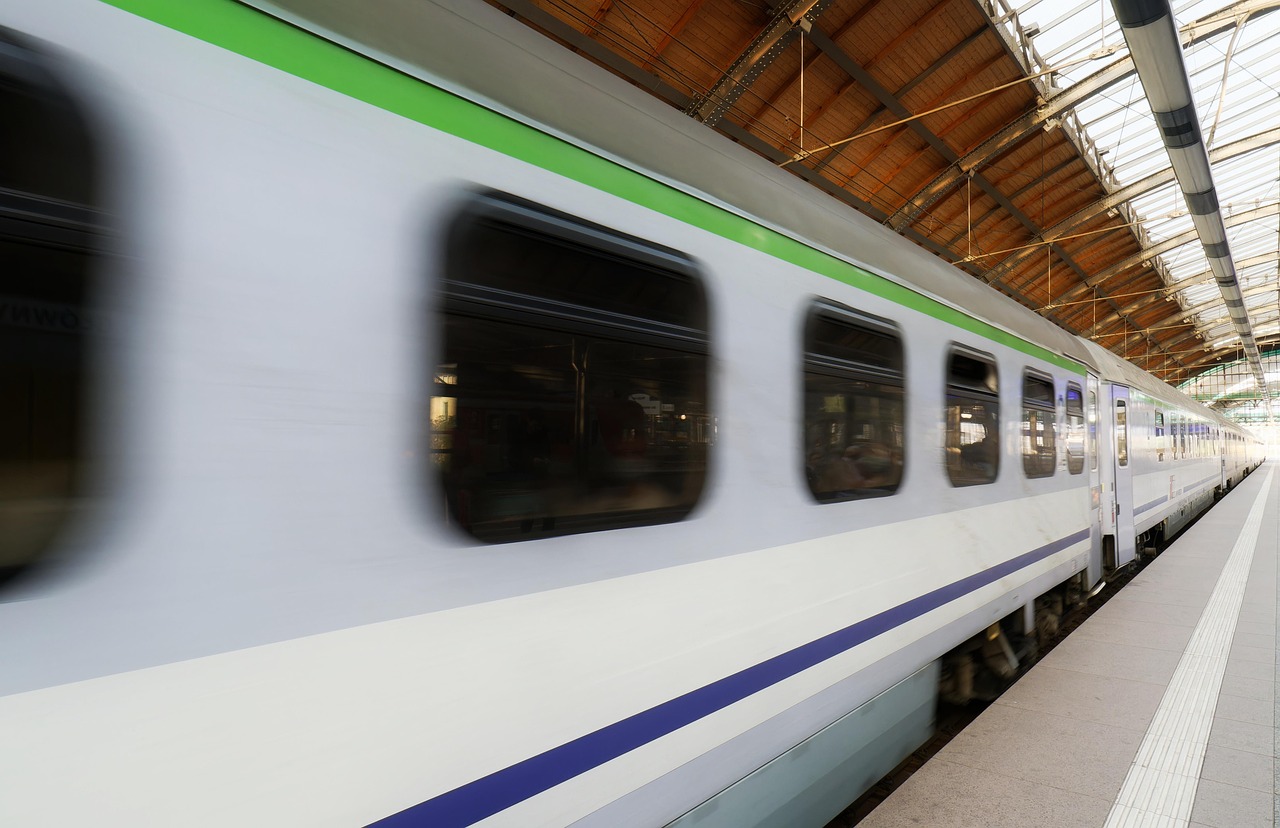 Closeup of the side of a quickly-moving maglev train