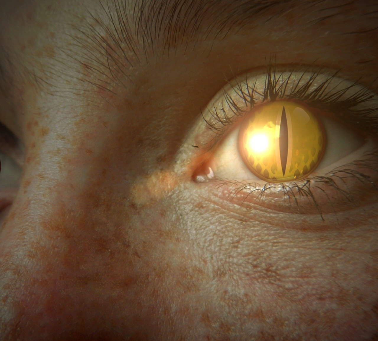A closeup of person shapeshifting into a reptile, with scaly patches on their skin and a yellow, slitted eye